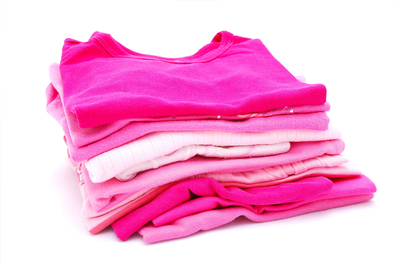stack of pink shirts